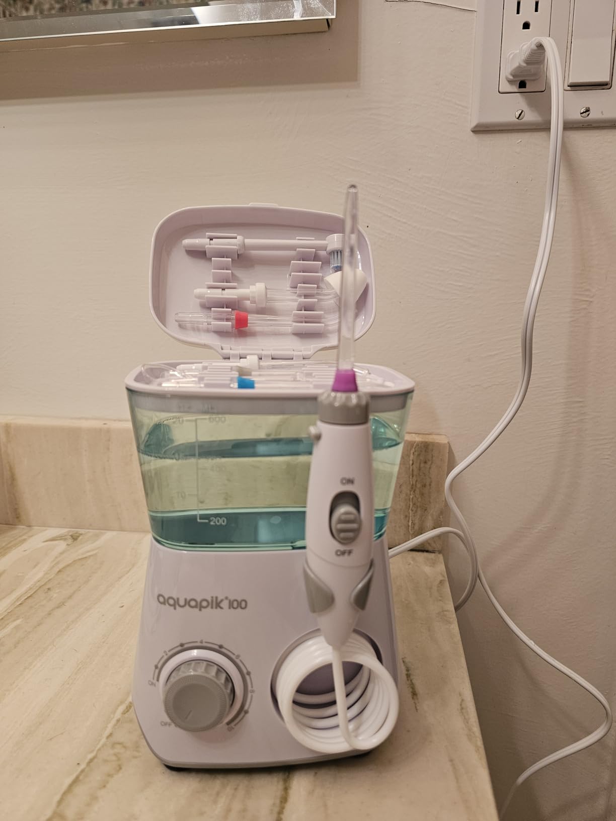 Aquapik 100 Countertop Water Flosser for Teeth, Corded Oral Irrigator Pick customer photo 1