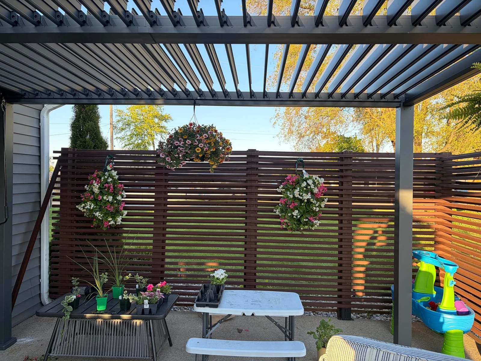 GarveeLife Louvered Pergola 10 ft x10', Outdoor Pergola with Adjustable Louvered Roof, Reinforced Aluminum Frame, Integrated Drainage System, Hardtop Gazebo for Patio, Deck, Wood Grain customer photo 1