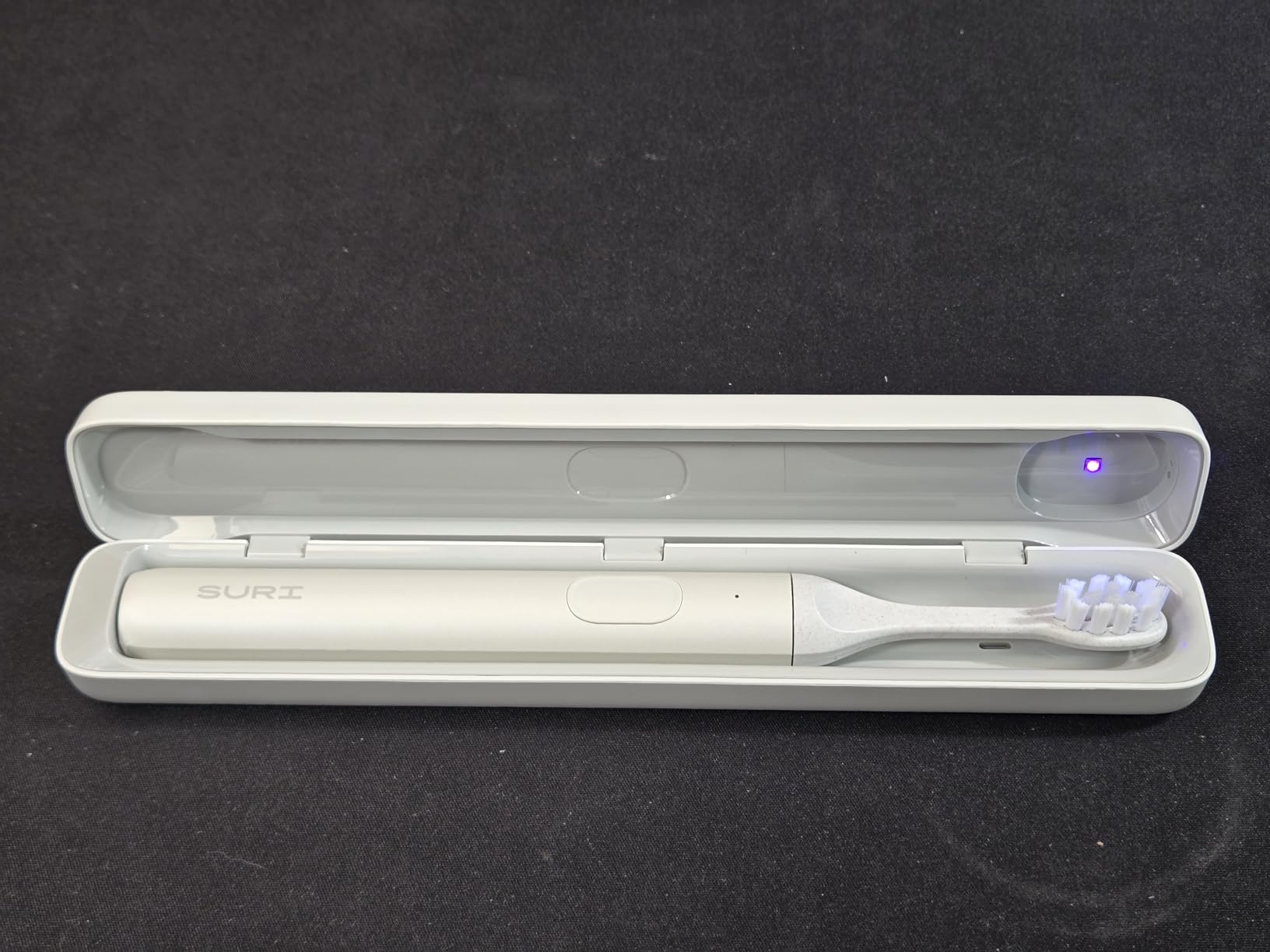 SURI Pro Sonic Electric Toothbrush | Over 4+ Weeks Battery | UV Cleaning Travel Case | Pressure Sensor | Aluminium Body | 2-Minute Timer | Plant-Based Head | Green customer photo 2